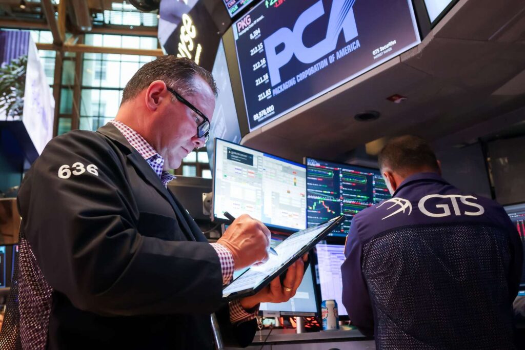 Dow Retreats from Record as Stocks Slide After Friday's Big Gains; Nvidia Earnings in Focus This Week