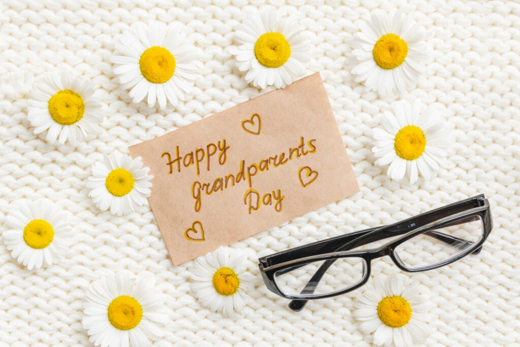 Note that says &quot;Happy Grandparents Day&quot; with glasses and daisies