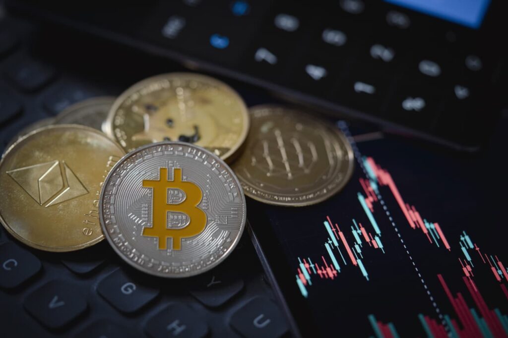 Bitcoin is back above $114,000 after the biggest crypto liquidation in history. But a choppy road lies ahead for investors.