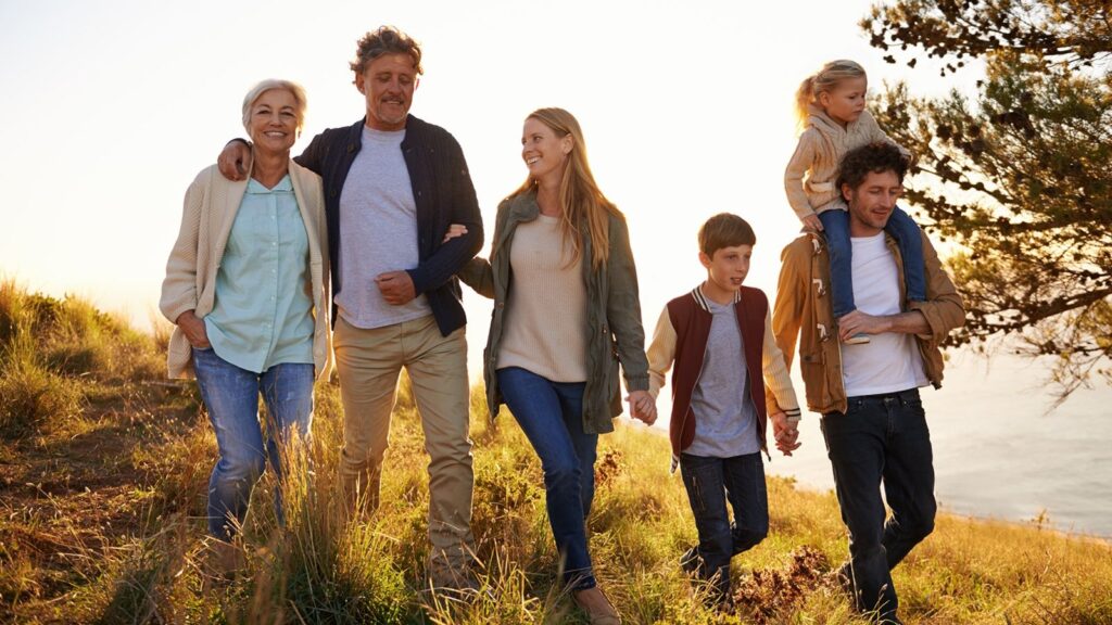 How to Leave Different Amounts to Adult Children Without Causing a Rift Shot of a happy family out on a morning walk together