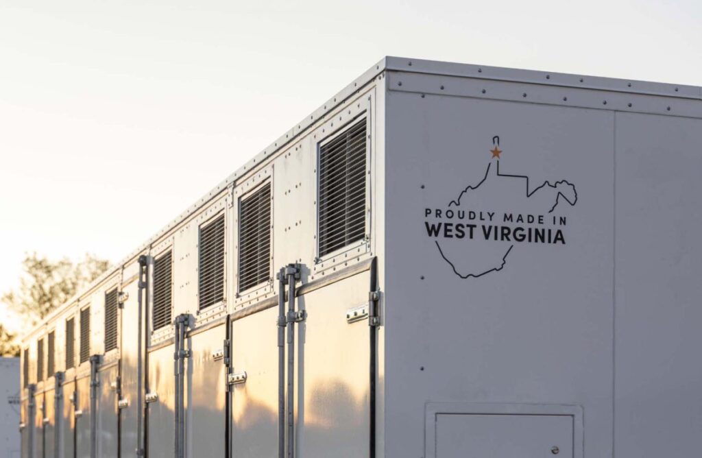 Google paid startup Form Energy $1B for its massive 100-hour battery A grid-scale battery stands against a clear sky.