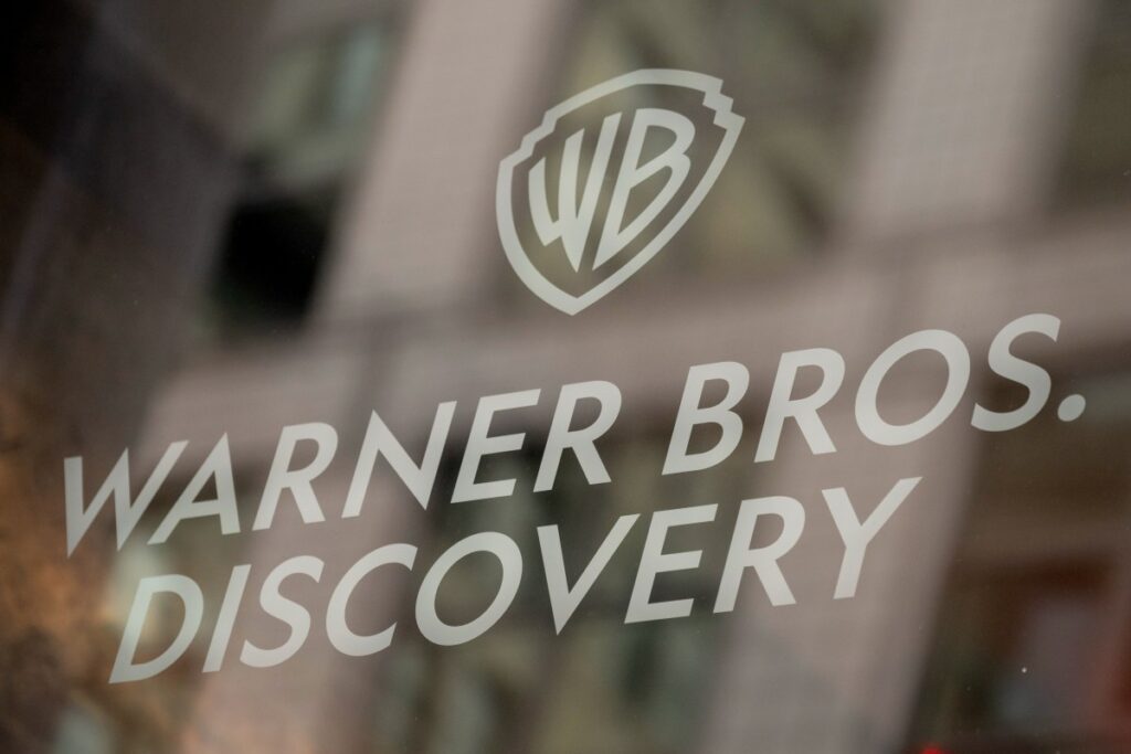 Netflix backs out of bid for Warner Bros. Discovery, giving studios, HBO, and CNN to Ellison-owned Paramount Signage at the Warner Bros. Discovery headquarters in New York