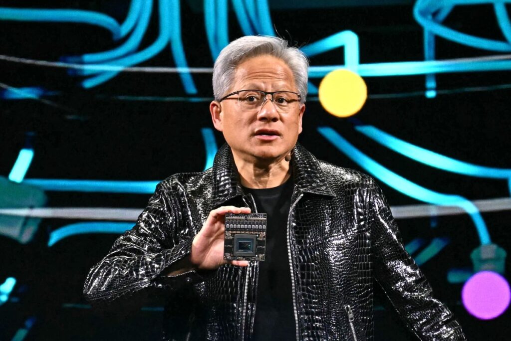 Jensen Huang says Nvidia is pulling back from OpenAI and Anthropic, but his explanation raises more questions than it answers Jensen Huang holds up chip at CES 2025