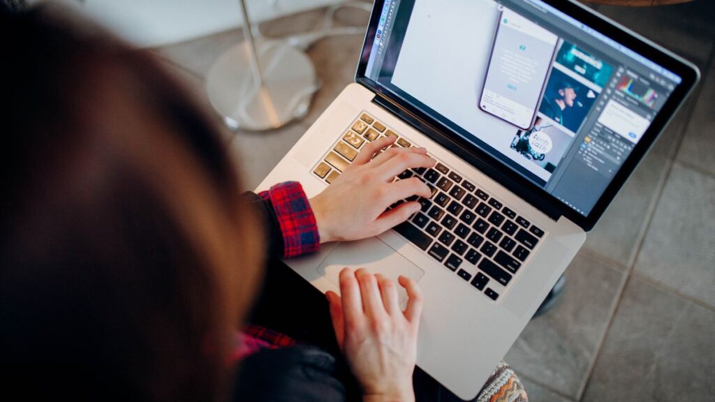 AI and freelancers, a person working on a laptop using AI tools, remote freelance work in 2026