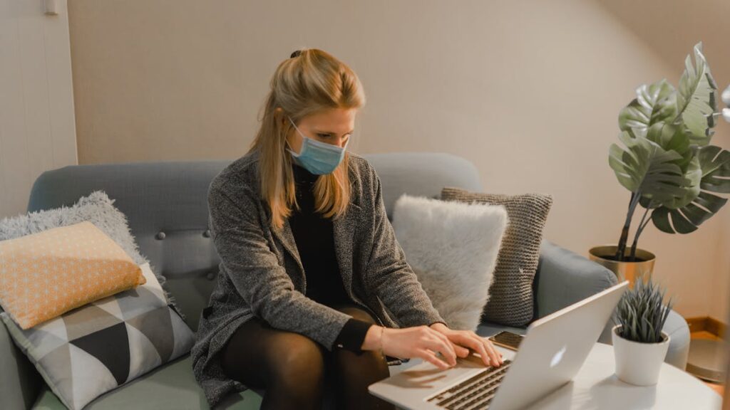 Person working remotely on a laptop in one of the best cities for remote work
