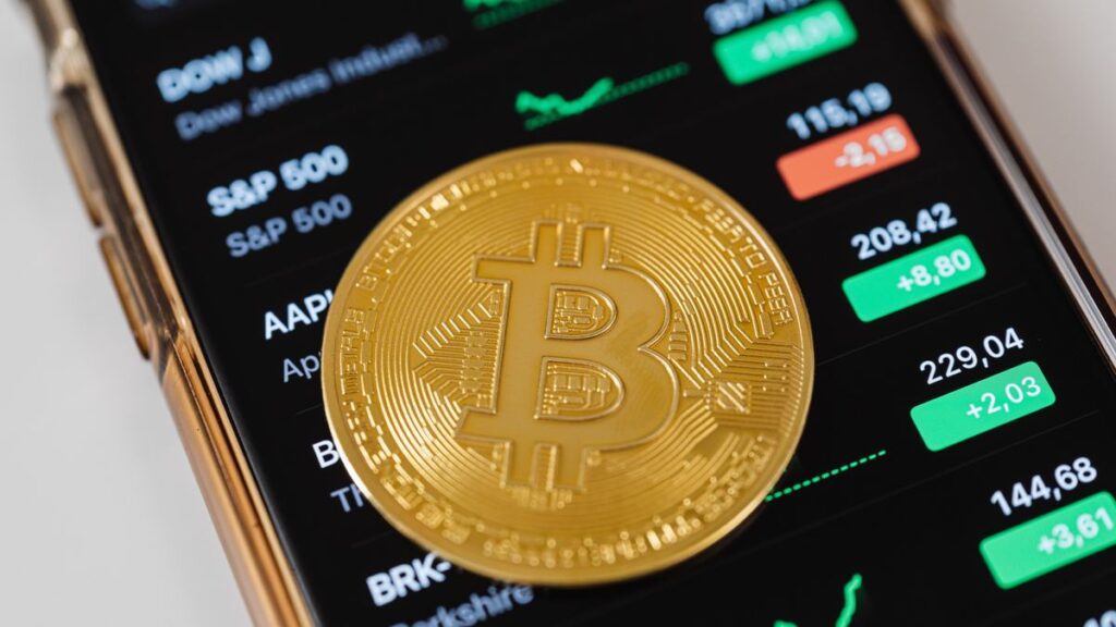 Person checking a digital wallet, reflecting on stablecoin regulation