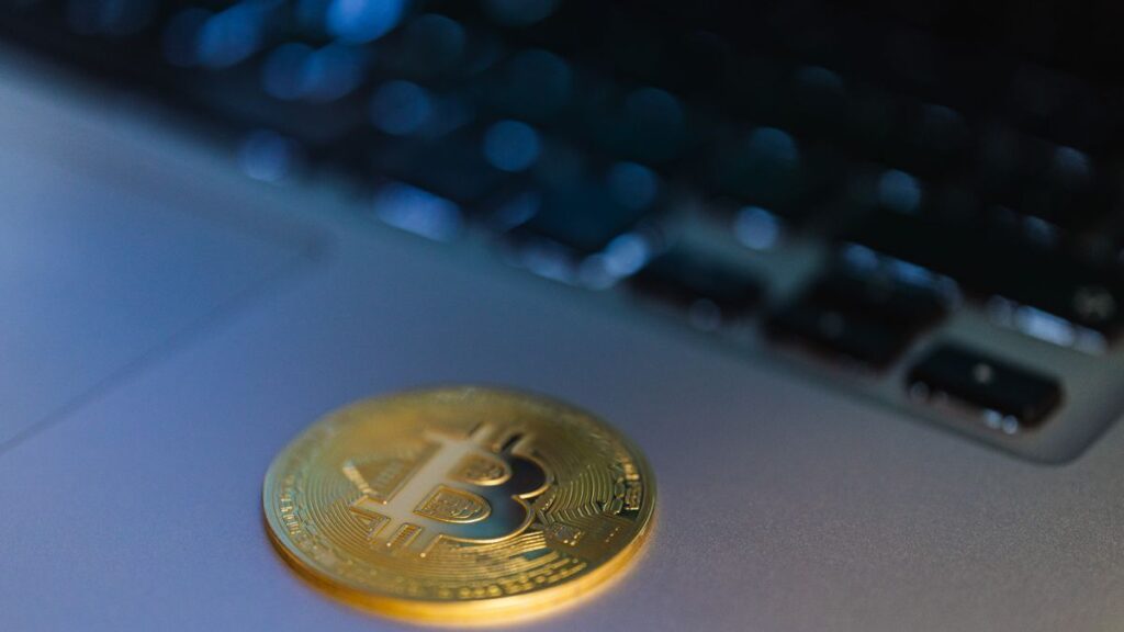 Regulated crypto payment gateway shown on a phone making a digital payment