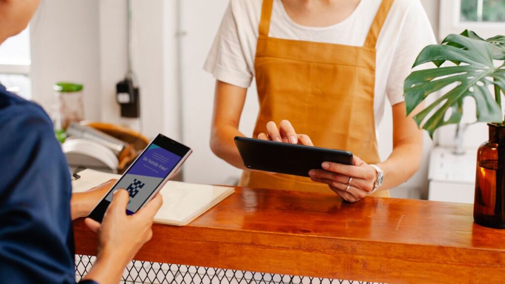 UPI Goes International: India’s Instant Payments Now Live in 9 Countries UPI international, scanning a QR code to pay with a smartphone, India digital payments abroad