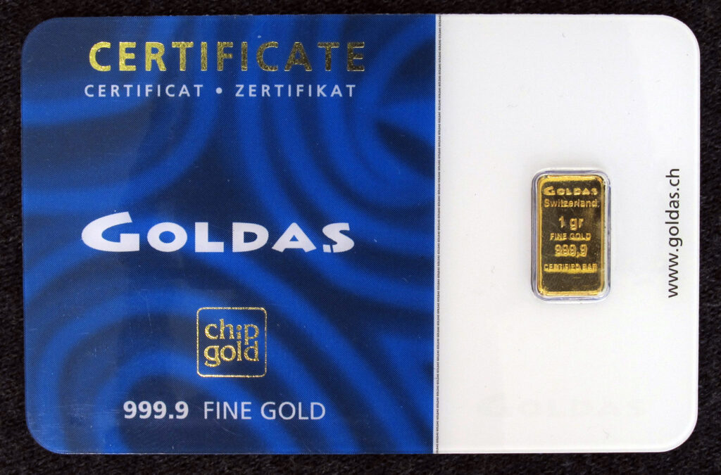 How to Track the Current Price of Gold for Smart Investing A close up of shiny bullion bars reflecting the current price of gold in the market