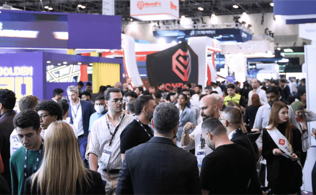 Crowded show floor at Forex Expo Dubai inside Dubai World Trade Centre